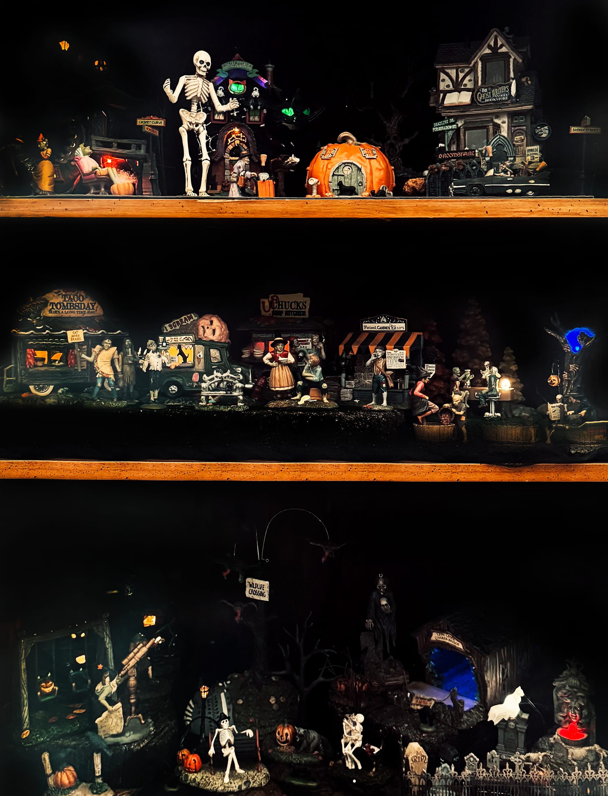 The full glory of Tina's Halloween village, featuring spooky ceramic miniatures.